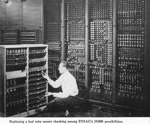 A technician replaces one of the ENIAC's 19,000 vaccum tubes